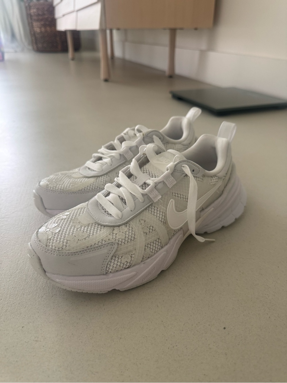 Nike women’s running shoe with floral design